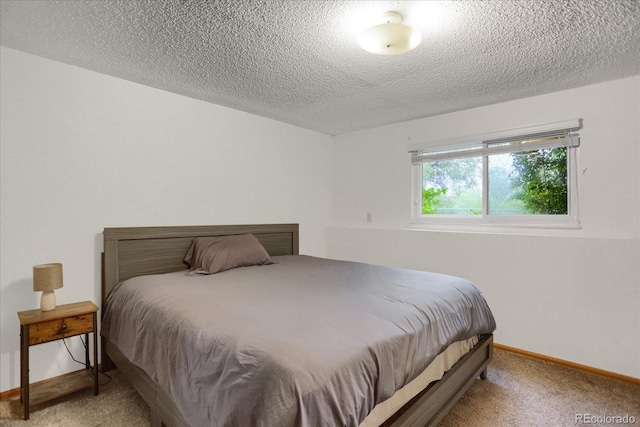 1010 Vondelpark Dr, Colorado Springs, CO 80907 - carpeted bedroom with a textured ceiling