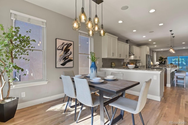 dining area featuring light hardwood / wood-style floors