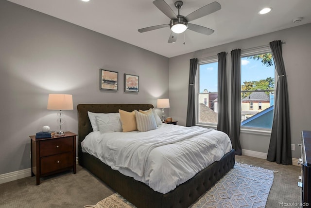 bedroom featuring ceiling fan and carpet flooring