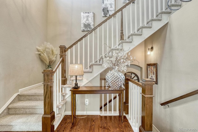 15235 W Iliff Ave, Lakewood, CO 80228 - stairway with wood finished floors and baseboards