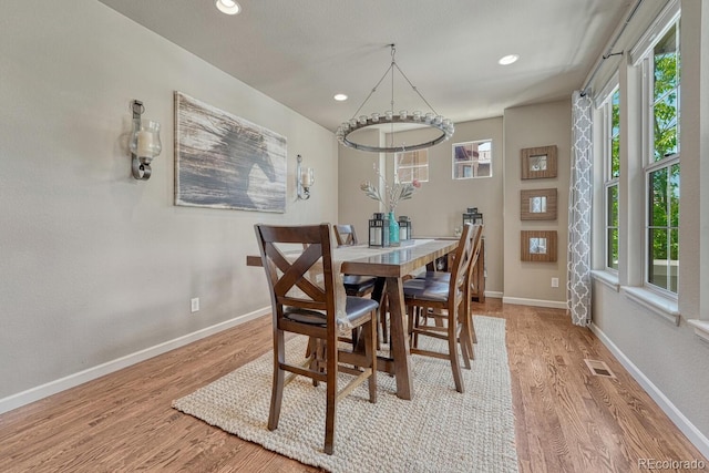 15235 W Iliff Ave, Lakewood, CO 80228 - dining room featuring wood finished floors, baseboards, and recessed lighting