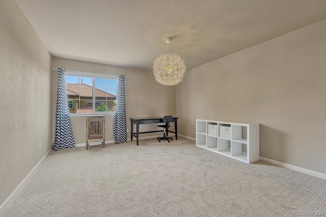 15235 W Iliff Ave, Lakewood, CO 80228 - carpeted spare room featuring a chandelier, baseboards, and a textured wall