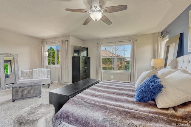 15235 W Iliff Ave, Lakewood, CO 80228 - bedroom with multiple windows, carpet, and ceiling fan