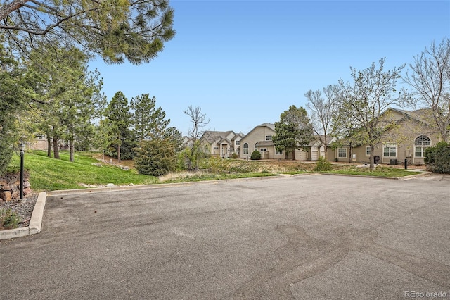 1661 S Fulton St, Aurora, CO 80247 - view of asphalt street featuring curbs and a residential view