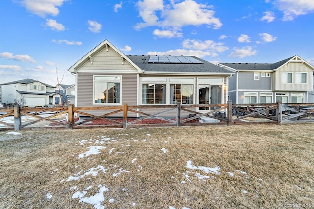 back of property with solar panels