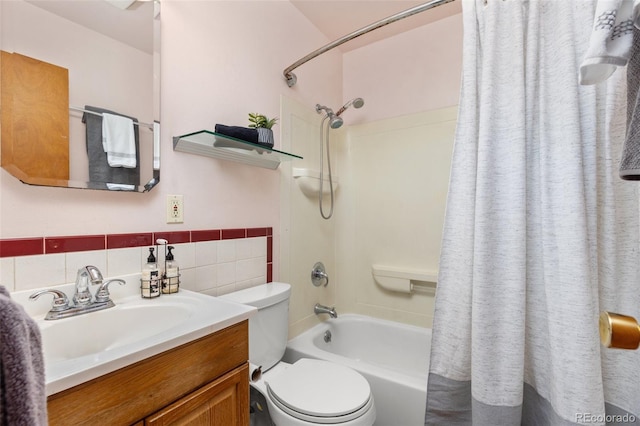 430 S Potomac Cir, Aurora, CO 80012 - full bath featuring shower / bath combination with curtain, toilet, vanity, and tile walls