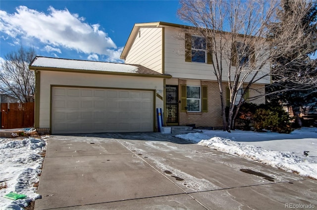 front of property with a garage