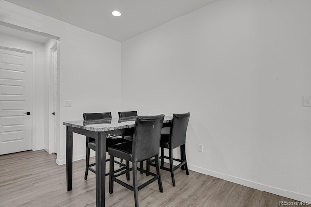 20999 E Quincy Dr, Aurora, CO 80015 - dining space with baseboards, light wood-type flooring, and recessed lighting