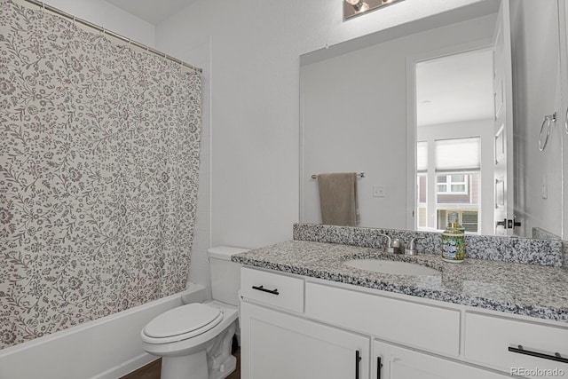 20999 E Quincy Dr, Aurora, CO 80015 - bathroom featuring vanity, toilet, and shower / tub combo with curtain