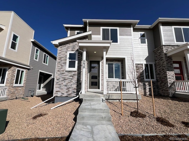 view of front of home featuring stone siding