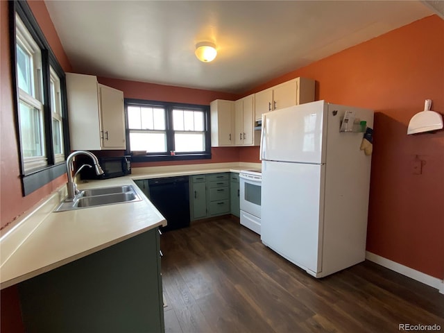 kitchen featuring black appliances, dark hardwood / wood-style flooring, white cabinets, and sink