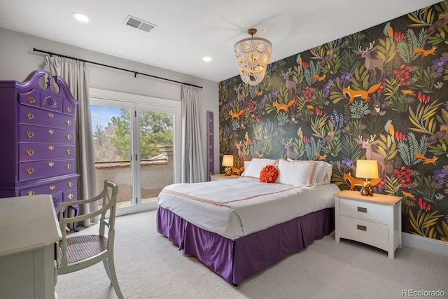 bedroom with light carpet, access to exterior, visible vents, an accent wall, and wallpapered walls