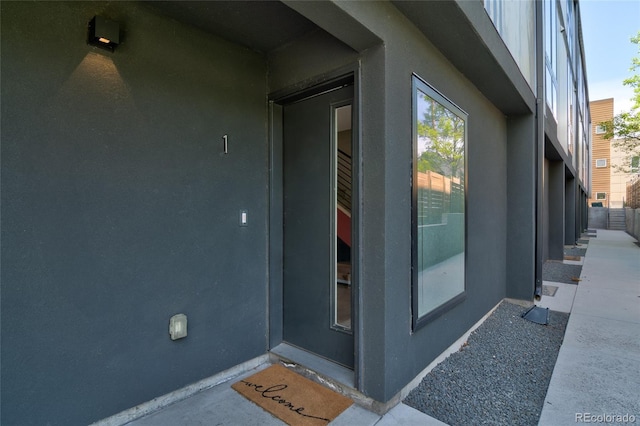 5125 W 29th Ave Unit 1, Denver, CO 80212 - doorway to property with stucco siding