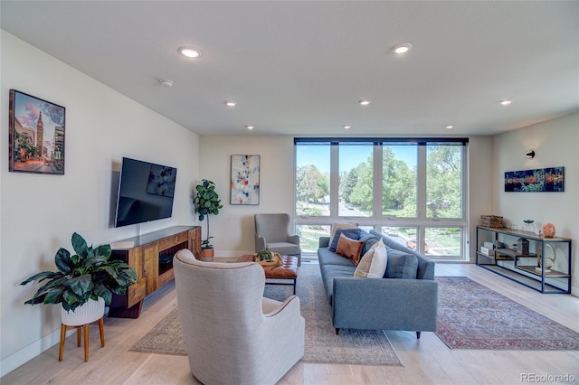 5125 W 29th Ave Unit 1, Denver, CO 80212 - living area with recessed lighting, light wood-style floors, and baseboards