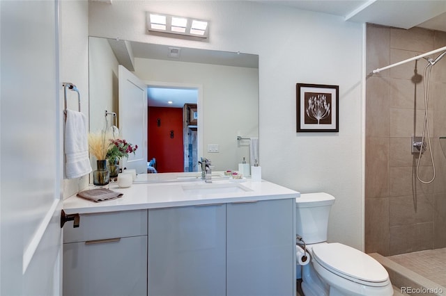 5125 W 29th Ave Unit 1, Denver, CO 80212 - full bathroom with toilet, tiled shower, and vanity