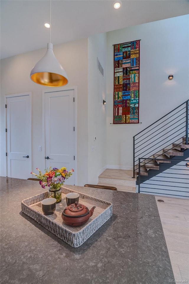 5125 W 29th Ave Unit 1, Denver, CO 80212 - foyer featuring stairs, recessed lighting, and wood finished floors