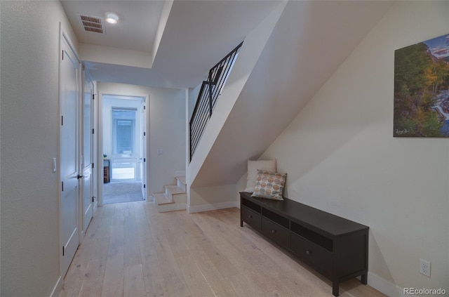5125 W 29th Ave Unit 1, Denver, CO 80212 - corridor with light wood-style floors, stairs, and baseboards