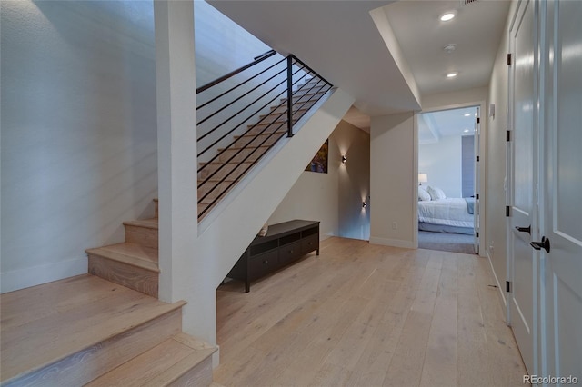 5125 W 29th Ave Unit 1, Denver, CO 80212 - stairs with hardwood / wood-style floors, baseboards, and recessed lighting