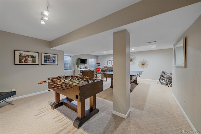 rec room featuring recessed lighting, light carpet, and baseboards