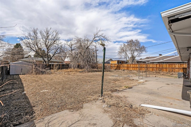 view of yard featuring a patio area and fence