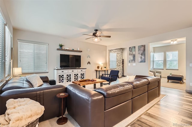 6883 E 132nd Pl, Thornton, CO 80602 - living area with light wood-type flooring and a ceiling fan