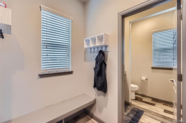 6883 E 132nd Pl, Thornton, CO 80602 - mudroom featuring wood finished floors and baseboards