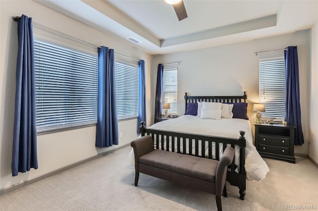 6883 E 132nd Pl, Thornton, CO 80602 - carpeted bedroom with a ceiling fan and a raised ceiling