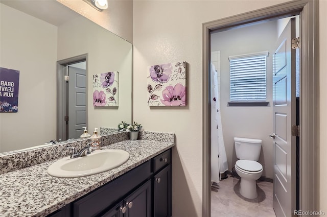 6883 E 132nd Pl, Thornton, CO 80602 - bathroom featuring vanity and tile patterned floors