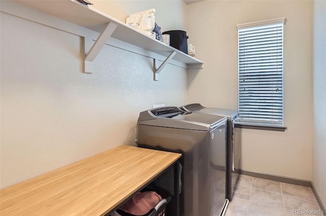 6883 E 132nd Pl, Thornton, CO 80602 - washroom featuring washer and clothes dryer and light tile patterned flooring