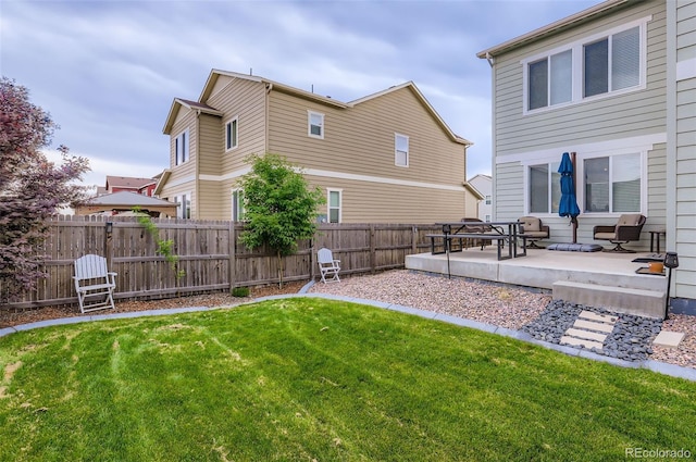 6883 E 132nd Pl, Thornton, CO 80602 - fenced backyard with a patio area