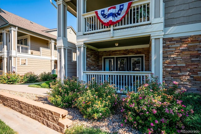 doorway to property with a balcony