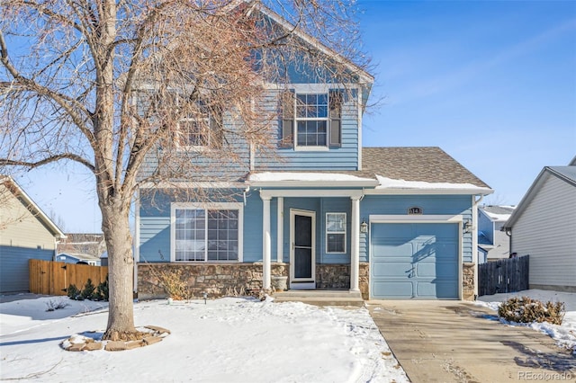 view of front of property with a garage