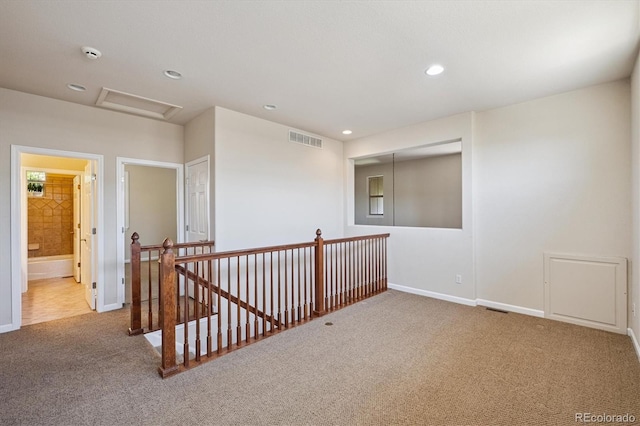 10205 Bluffmont Dr, Lone Tree, CO 80124 - hall with an upstairs landing, carpet flooring, attic access, and recessed lighting