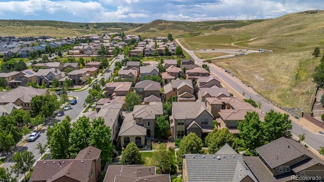 10205 Bluffmont Dr, Lone Tree, CO 80124 - aerial view of property's location with nearby suburban area and mountains