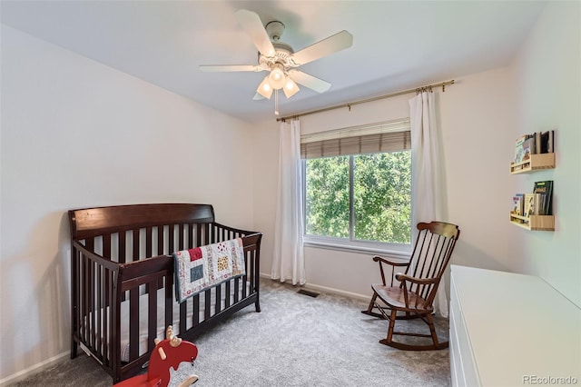 728 Poppywood Pl, Highlands Ranch, CO 80126 - bedroom with carpet floors, a nursery area, baseboards, and a ceiling fan