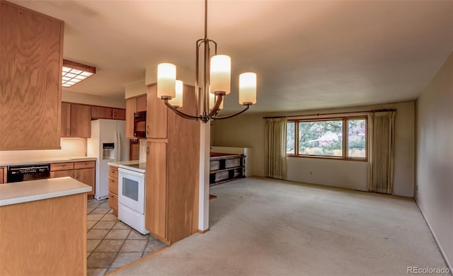 kitchen featuring light countertops, an inviting chandelier, light carpet, and black appliances
