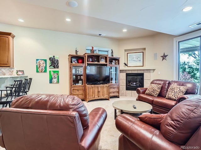 5092 S Allison Way, Littleton, CO 80123 - living area with recessed lighting, a tile fireplace, and light colored carpet