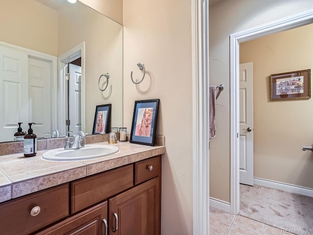 5092 S Allison Way, Littleton, CO 80123 - bathroom featuring vanity and tile patterned flooring