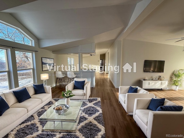 living room with lofted ceiling, hardwood / wood-style flooring, and ceiling fan