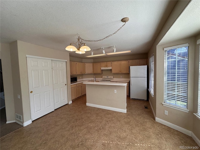 kitchen featuring light carpet, a kitchen island with sink, pendant lighting, and white appliances