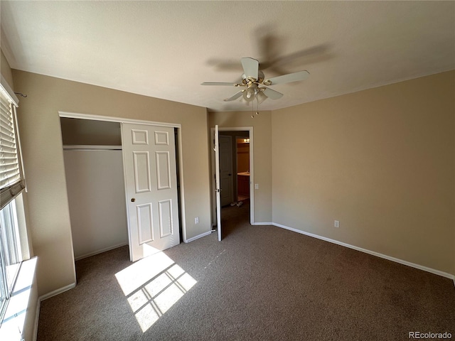 unfurnished bedroom featuring carpet, a closet, and ceiling fan