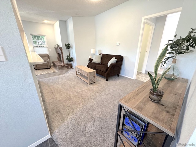4760 S Wadsworth Blvd Unit F105, Littleton, CO 80123 - carpeted living area featuring baseboards