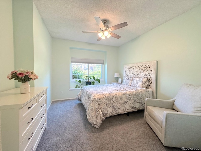 4760 S Wadsworth Blvd Unit F105, Littleton, CO 80123 - bedroom with carpet floors, a textured ceiling, ceiling fan, and baseboards