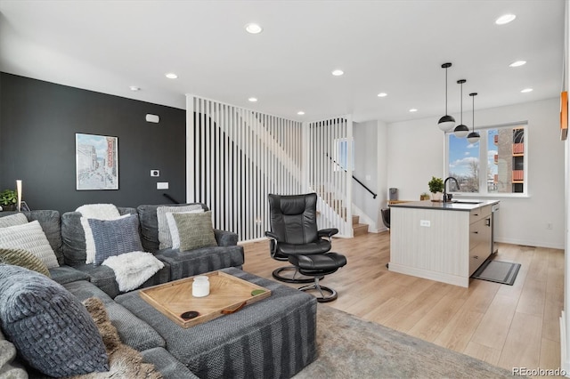 3101 W 47th Ave Unit 14, Denver, CO 80211 - living area with light wood-style floors, stairs, and recessed lighting