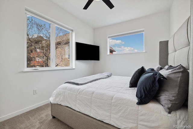 3101 W 47th Ave Unit 14, Denver, CO 80211 - carpeted bedroom with baseboards and a ceiling fan