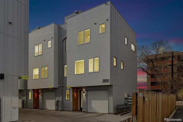 3101 W 47th Ave Unit 14, Denver, CO 80211 - view of front of home with an attached garage and concrete driveway