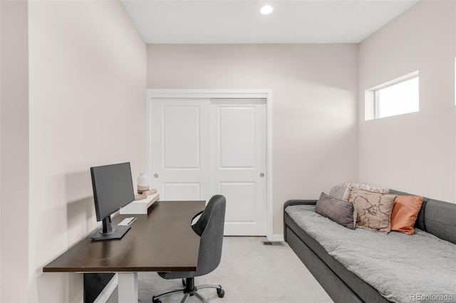 office space with recessed lighting, light carpet, and baseboards