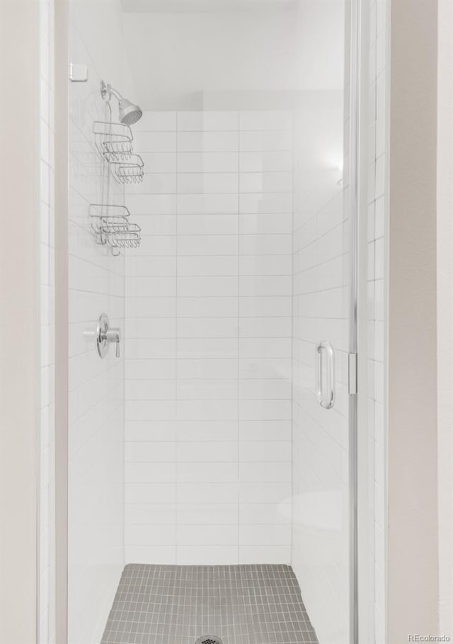 bathroom with a stall shower