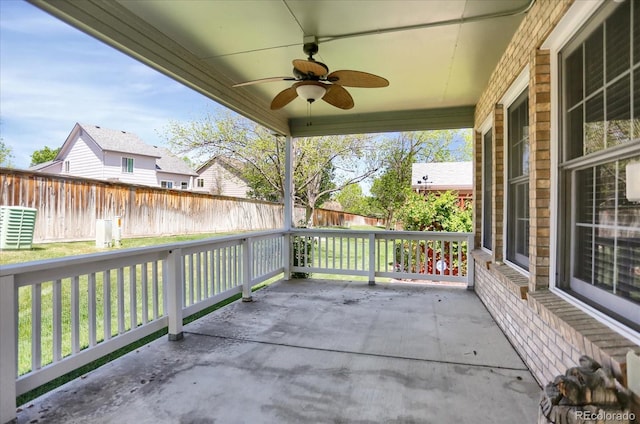 8951 Greenwich St, Highlands Ranch, CO 80130 - view of patio featuring ceiling fan and fence
