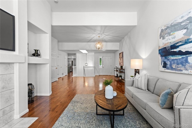 9491 Southern Hills Cir, Lone Tree, CO 80124 - living room featuring wood finished floors